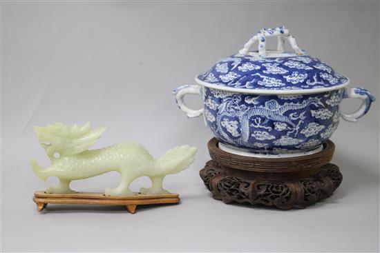 A Chinese blue and white bowl and cover, wood stand